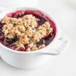 Close up of freshly baked stone fruit cobbler.