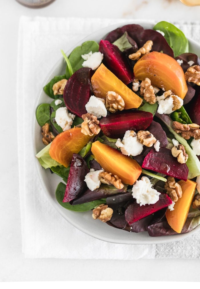 A simple and delicious beet salad made with roasted beets, goat cheese, and toasted walnuts finished with balsamic. #vegetarian #glutenfree #salad #beets