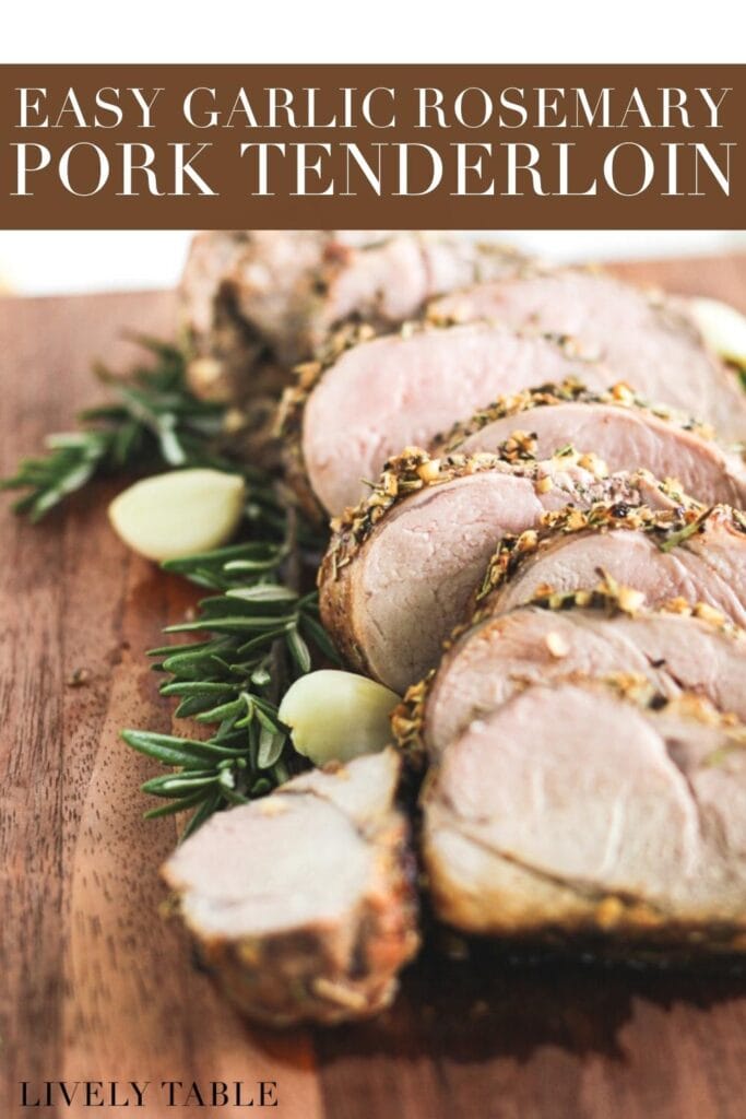 closeup of sliced pork tenderloin on a cutting board surrounded by rosemary and garlic with text overlay.