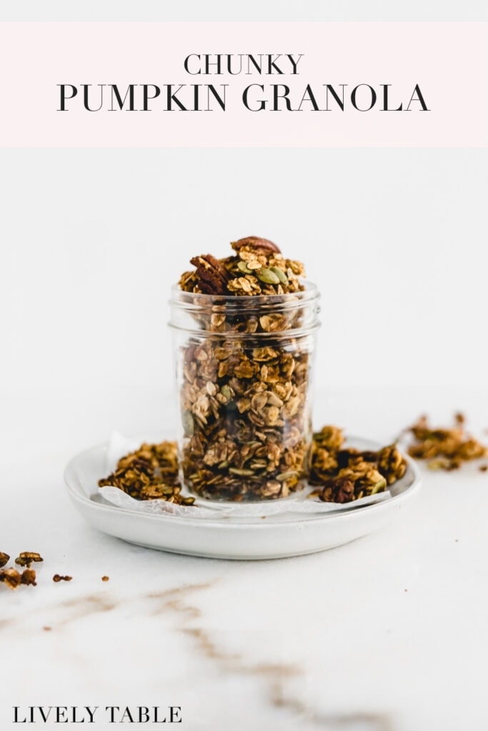 Chunky pumpkin granola in a glass jar with text overlay.