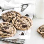 Close up of neiman marcus chocolate chip cookies on a cooling rack.