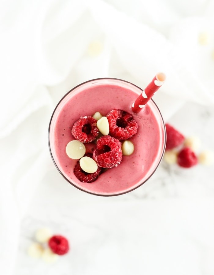A secretly healthy white chocolate raspberry smoothie is the perfect sweet treat for Valentine's Day breakfast!
