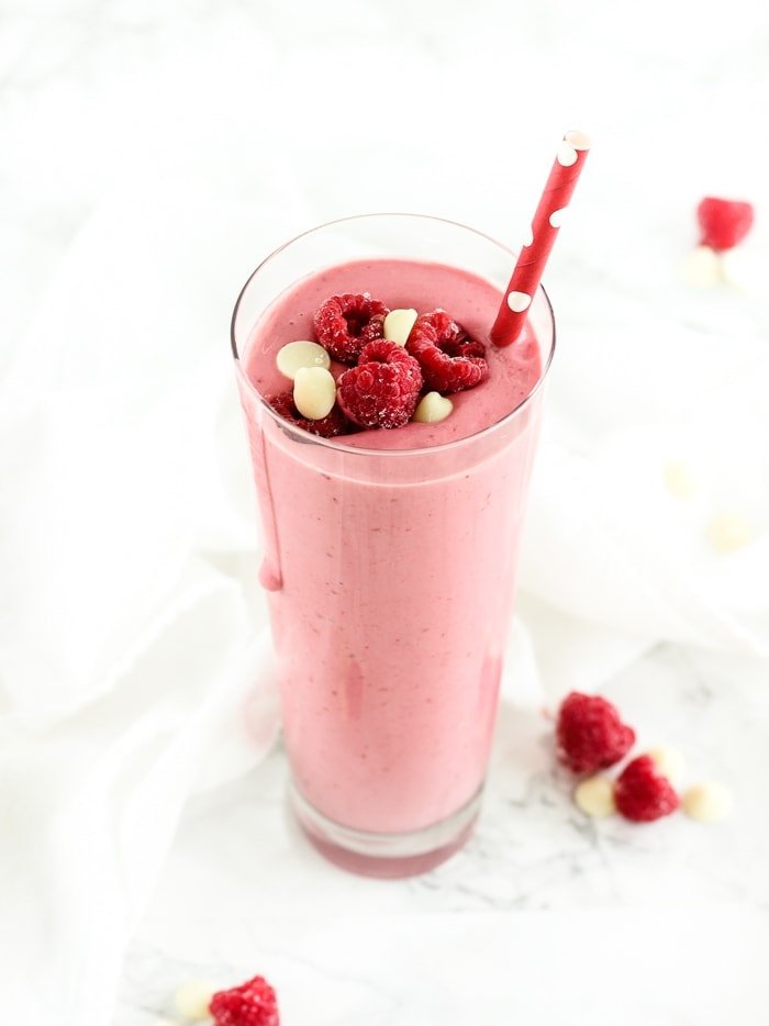 A secretly healthy white chocolate raspberry smoothie is the perfect sweet treat for Valentine's Day breakfast!