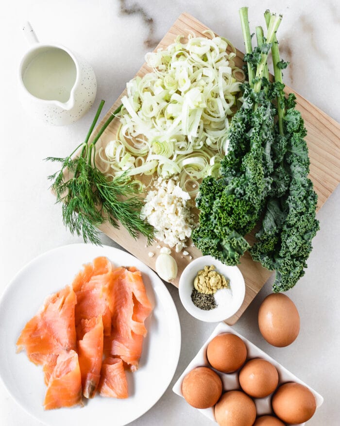 overhead view of ingredients needed to make a smoked salmon and kale frittata.