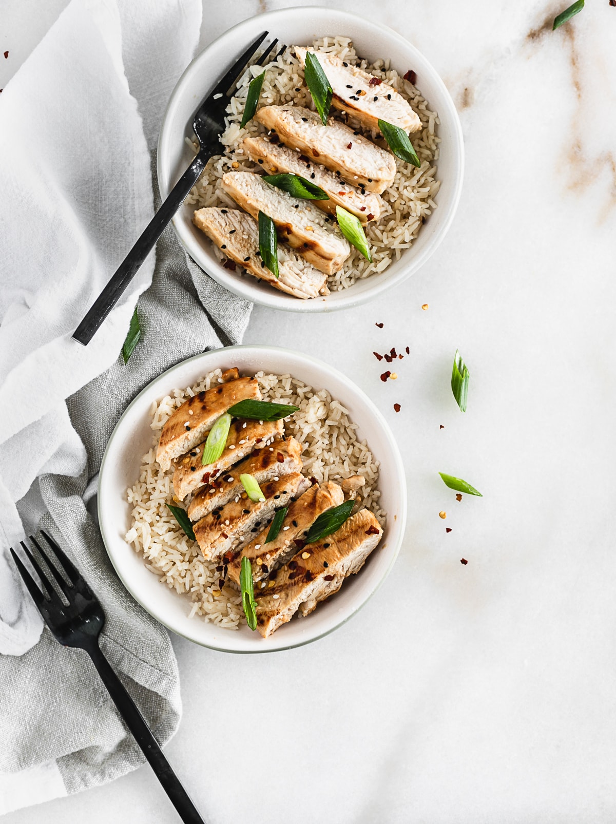 grilled miso chicken in a bowl with rice.