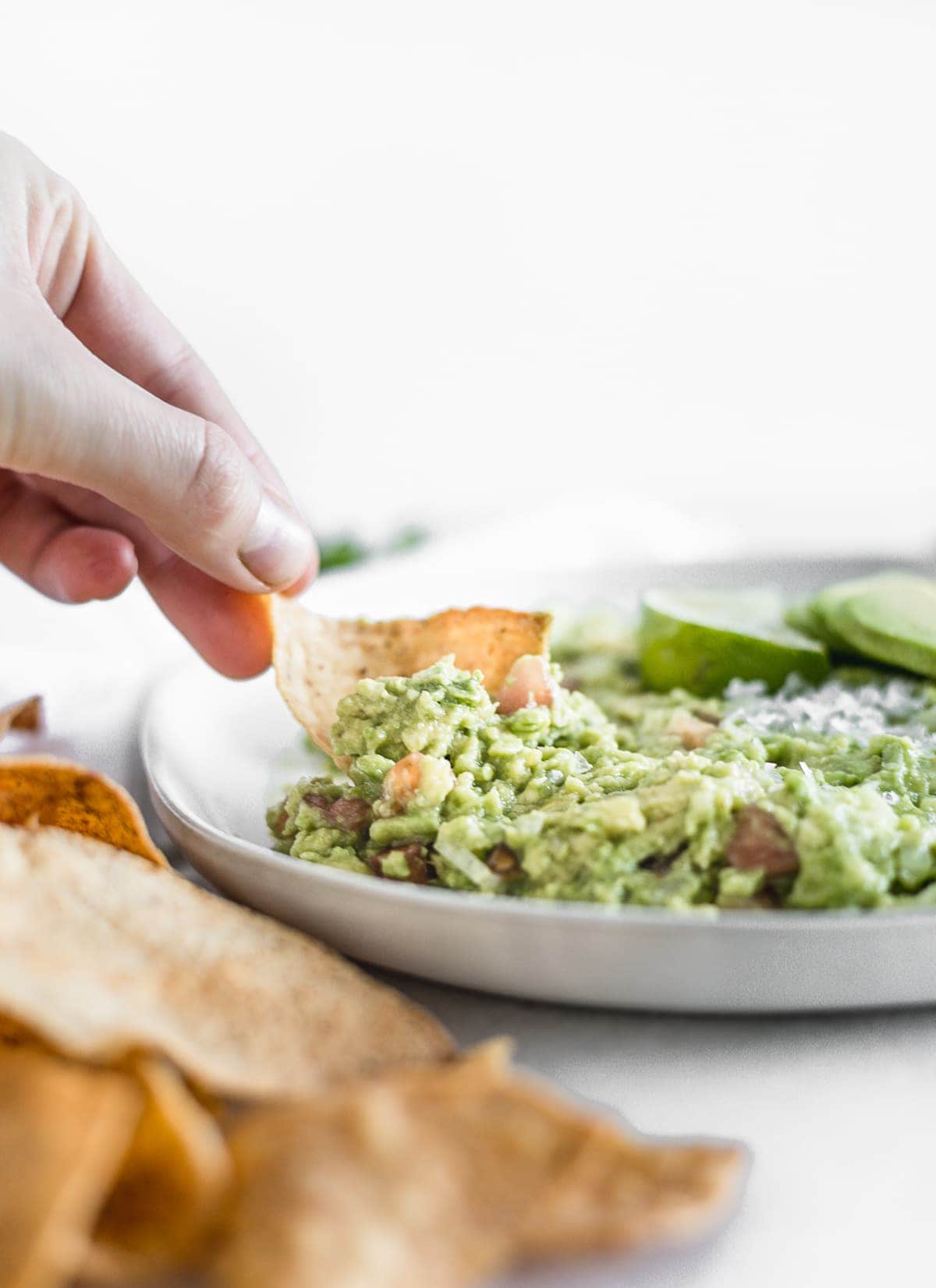 This easy guacamole recipe has just a few simple ingredients and is the perfect healthy dip to accompany any Tex-Mex dish! (gluten-free, dairy-free, nut-free, vegan)
