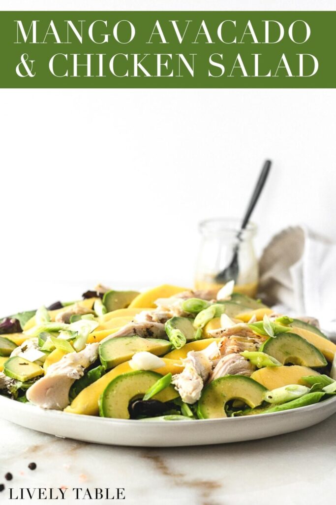 mango avocado and roasted chicken salad on a plate with text overlay.