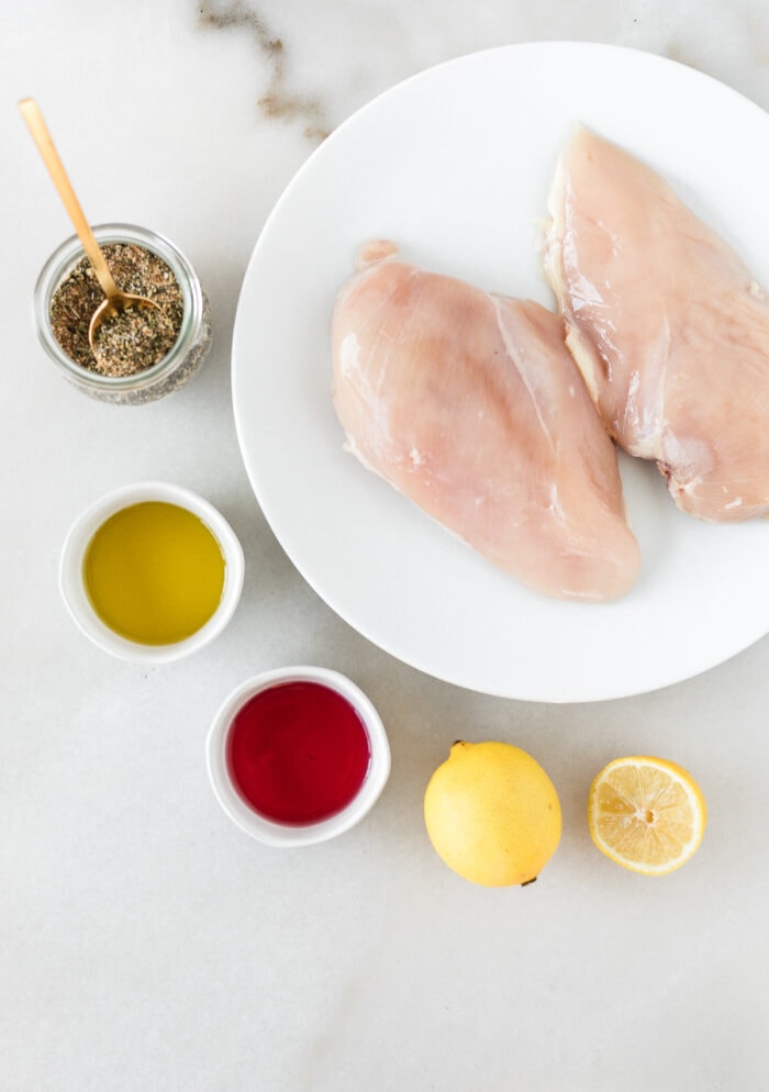 overhead view of ingredients needed to make greek chicken.