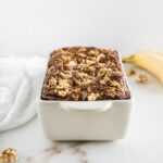 Healthy banana nut bread in a loaf pan.