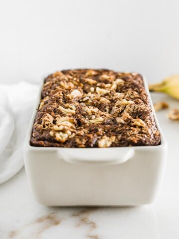 Healthy banana nut bread in a loaf pan.