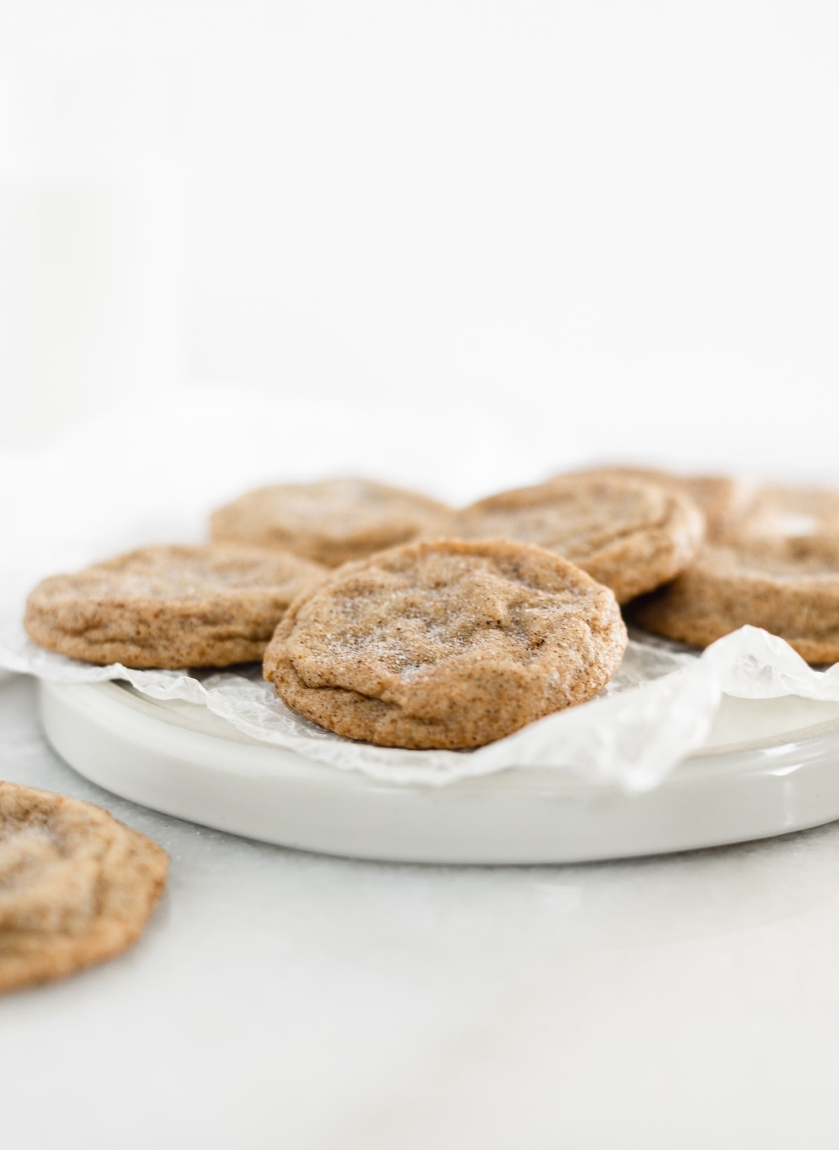 Chai Spiced Snickerdoodles have soft and buttery insides and sweet and spicy, slightly crunchy outsides. The perfect cookies for pairing with a cup of tea. (vegetarian, dairy-free option) via livelytable.com