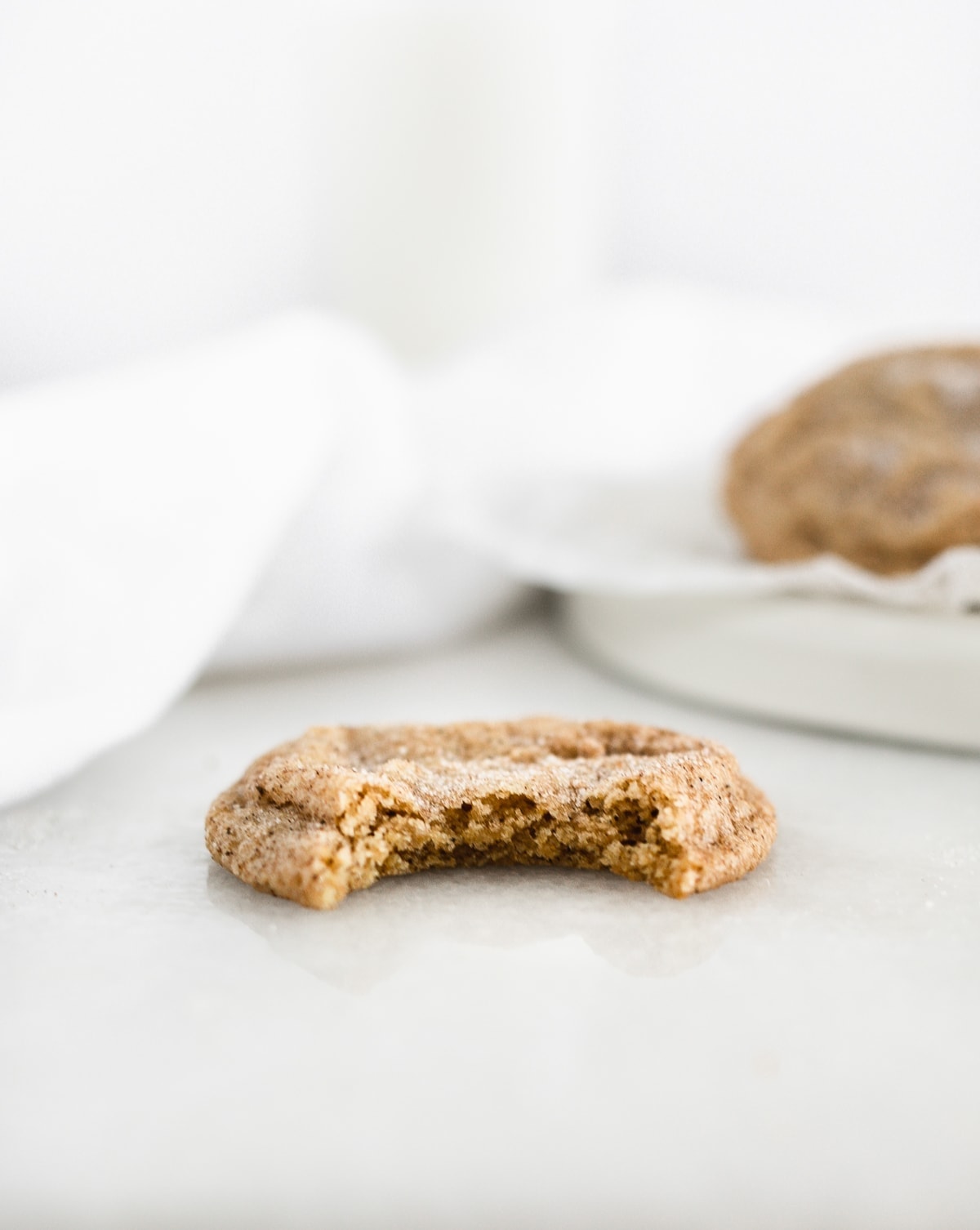 Chai Spiced Snickerdoodles have soft and buttery insides and sweet and spicy, slightly crunchy outsides. The perfect cookies for pairing with a cup of tea. (vegetarian, dairy-free option) via livelytable.com