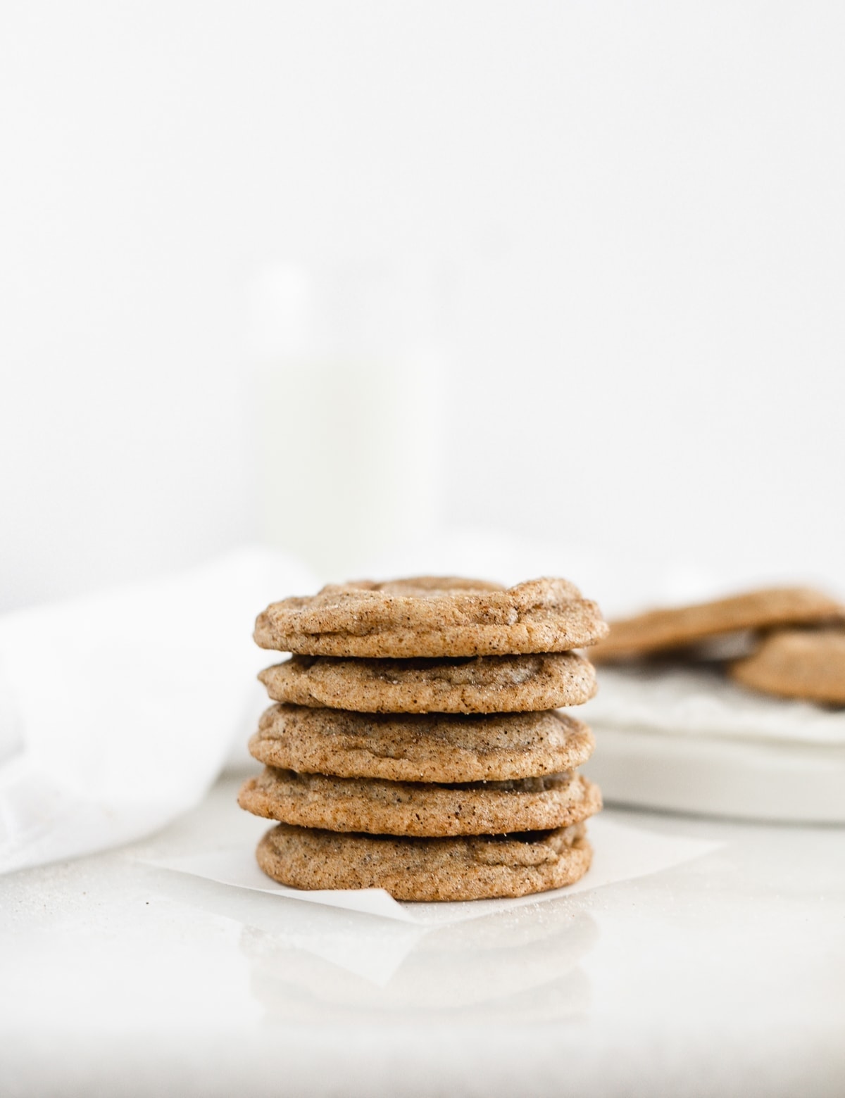 Chai Spiced Snickerdoodles have soft and buttery insides and sweet and spicy, slightly crunchy outsides. The perfect cookies for pairing with a cup of tea. (vegetarian, dairy-free option) via livelytable.com