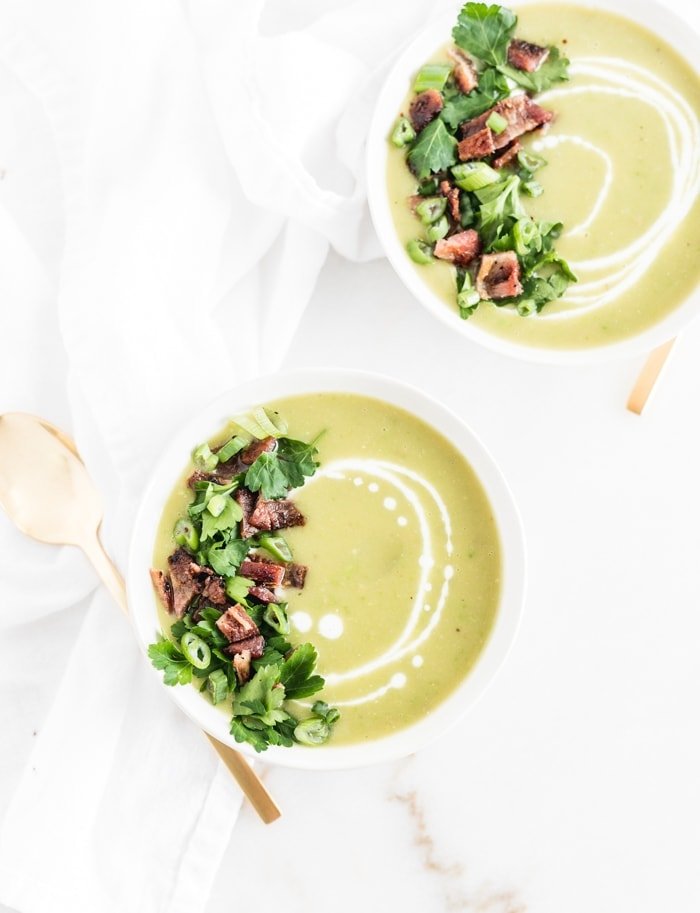 2 bowls of creamy potato split pea soup overhead