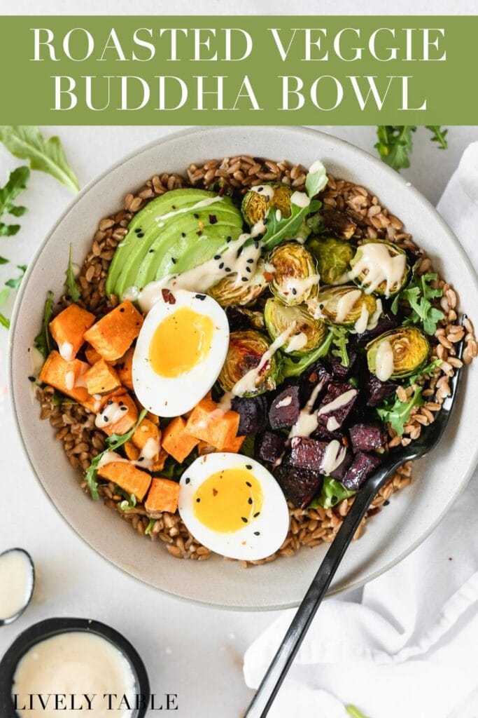 overhead view of roasted vegetable grain bowl with a soft boiled egg and tahini sauce with text overlay.