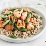 This healthy Orange Peel Chicken is a lighter version of your favorite takeout, bursting with flavor and tons of veggies! It's a delicious, one pan dinner perfect for weeknights! (no added sugar, gluten-free option) | via livleytable.com