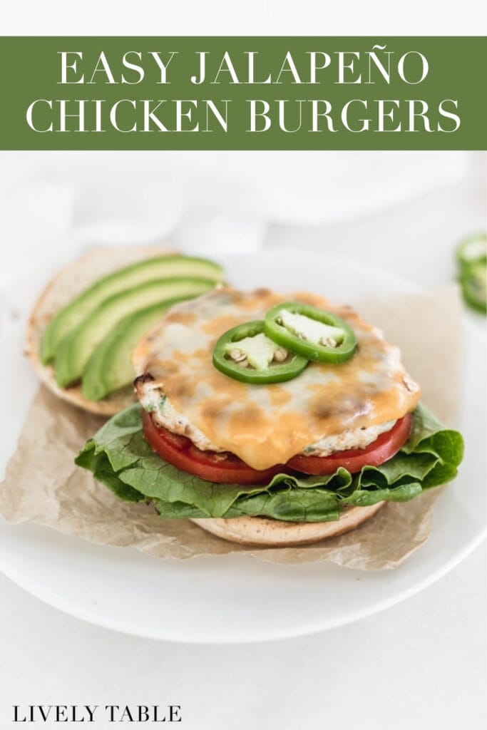chicken burger on a bun with a cheese and jalapeño slices on top with text overlay.