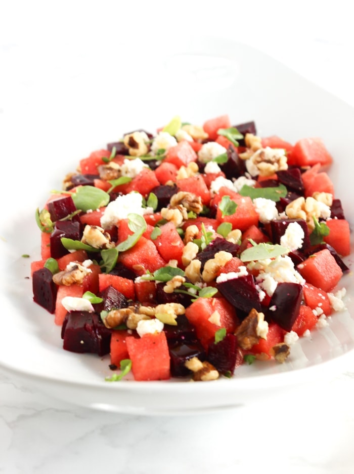 This gorgeous watermelon beet salad is a refreshing summer salad for all of your cookouts and summer meals! (vegetarian, gluten-free) | via livelytable.com