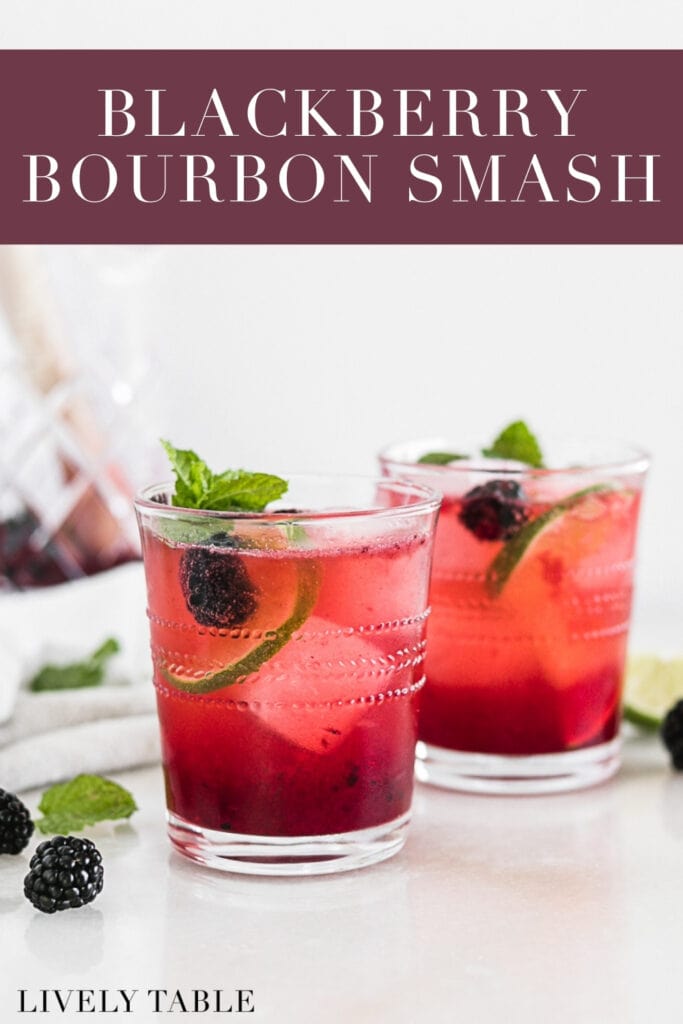 blackberry bourbon smash cocktails in glasses garnished with mint with text overlay.