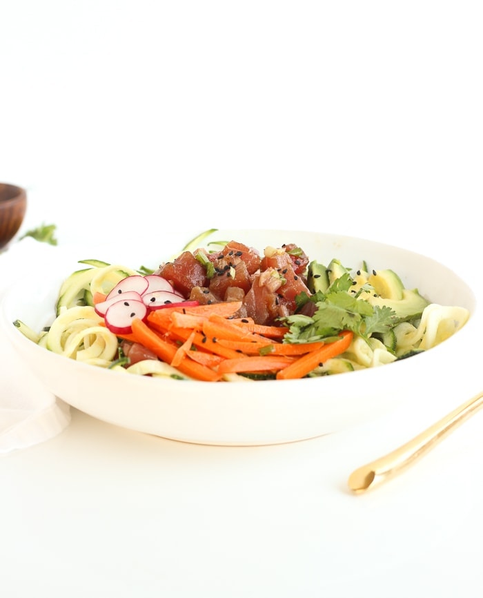 If you love poke or sushi, you'll love this Zucchini Noodle Poke Bowl! It's is a fresh and delicious meal that requires no cooking and is full of fresh vegetables. (gluten-free, dairy-free)