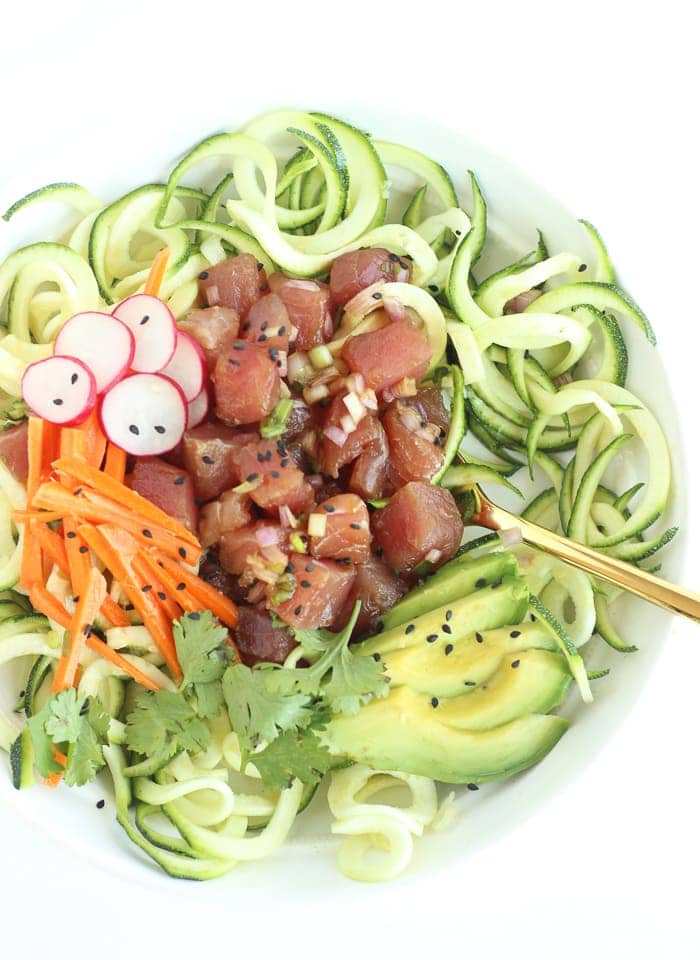 If you love poke or sushi, you'll love this Zucchini Noodle Poke Bowl! It's is a fresh and delicious meal that requires no cooking and is full of fresh vegetables. (gluten-free, dairy-free)