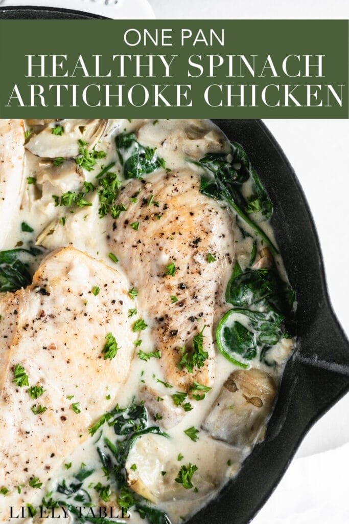 closeup of spinach artichoke chicken in a cast iron skillet with text overlay.