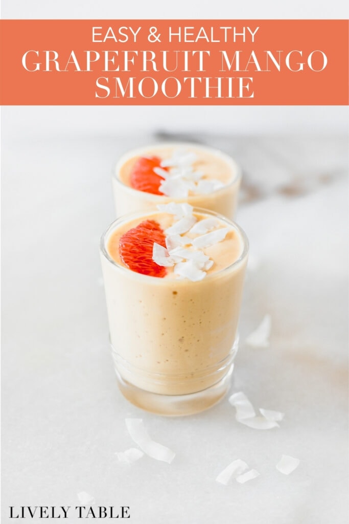 two grapefruit smoothies in glasses each topped with a grapefruit slice and coconut flakes with text overlay.