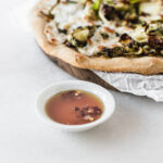 gluten free caramelized onion brussels sprout pizza