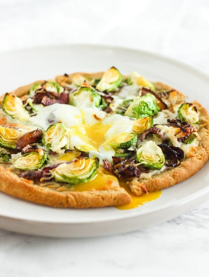 gluten free caramelized onion brussels sprout pizza with egg