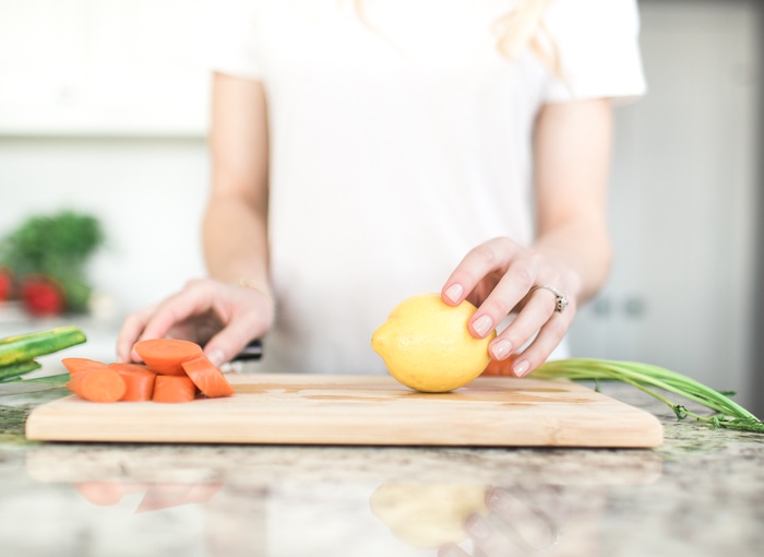 carrots ad lemon on cutting board