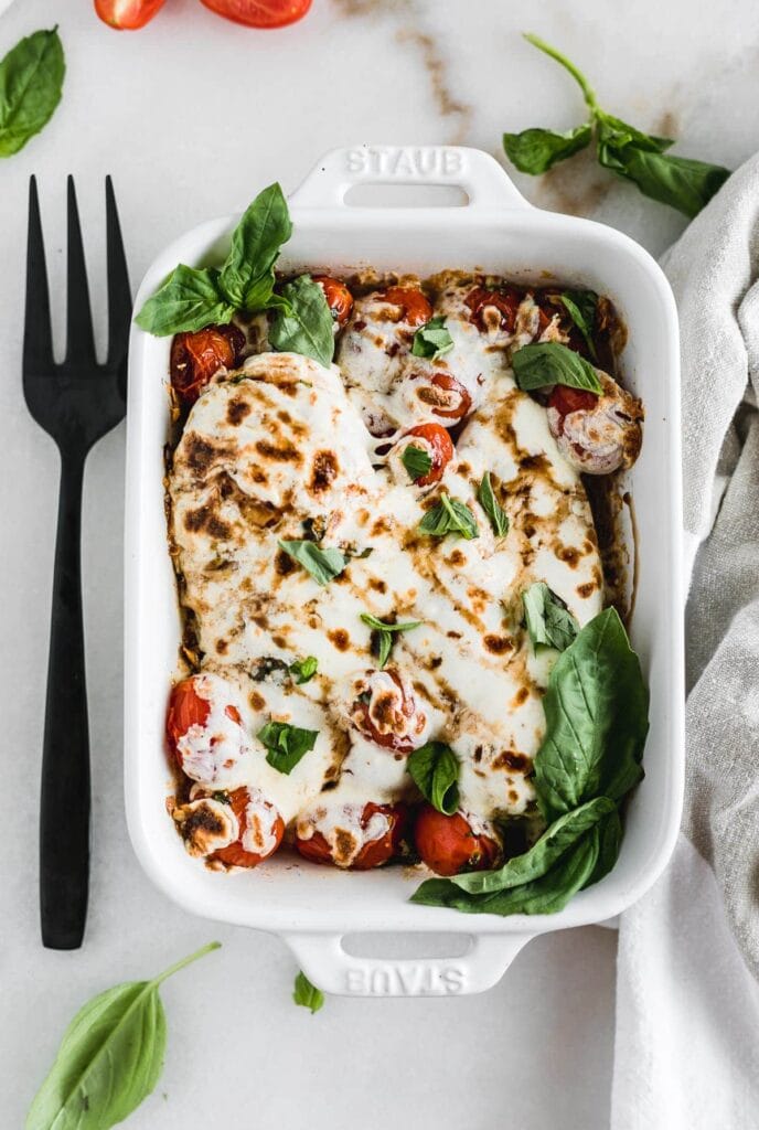 Easy oven baked Caprese chicken fresh out of the oven.