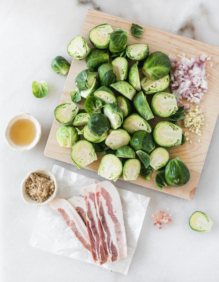overhead view of ingredients needed to make Bourbon Brown Sugar Roasted Brussels Sprouts with Bacon