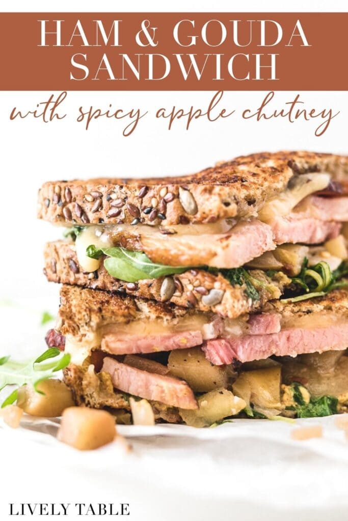 closeup of ham gouda sandwich with apple chutney with text overlay.