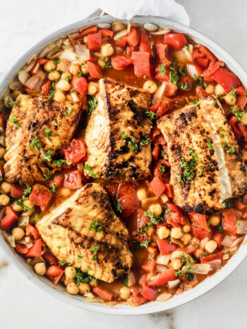 overhead view of moroccan cod and chickpea skillet.