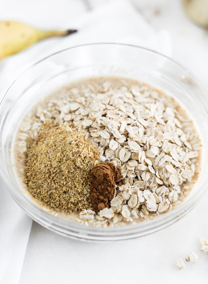 a bowl with oats, flaxseed, and cinnamon