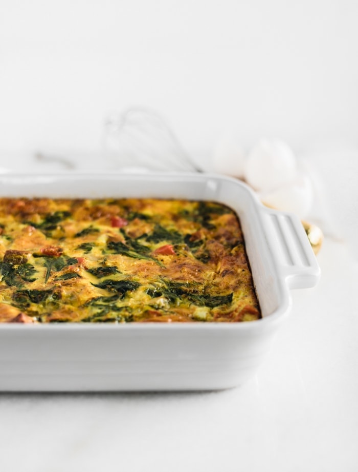 veggie sweet potato casserole in a white square caking dish