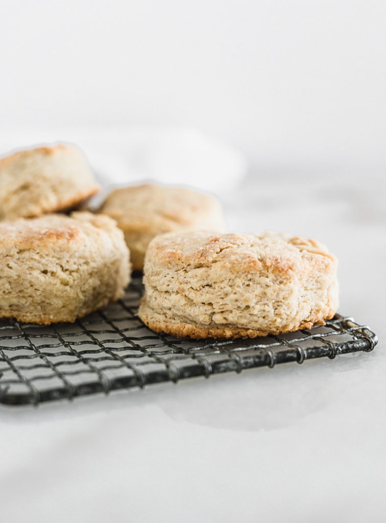 sourdough biscuits on a cooling rack.