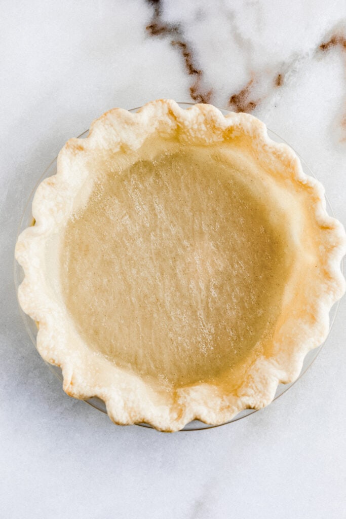 overhead view of parbaked pie crust.