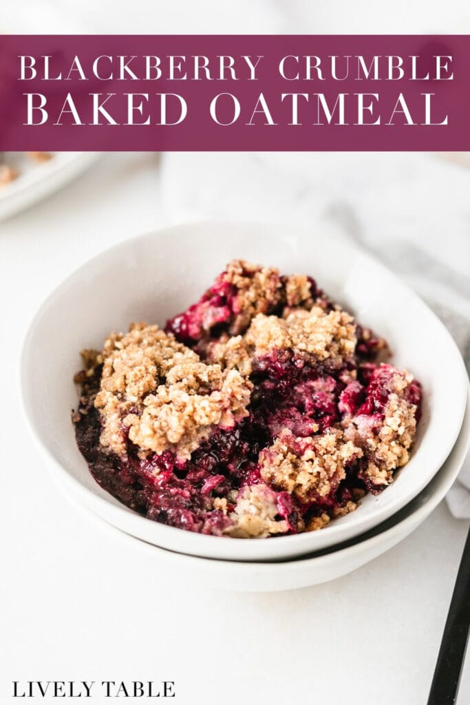 blackberry crumble baked oatmeal in a white bowl with a black spoon beside it with text overlay.
