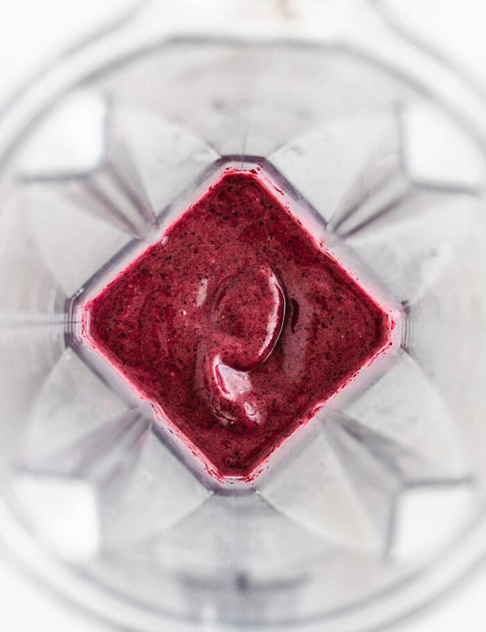 blended cherry berry smoothie in a blender.