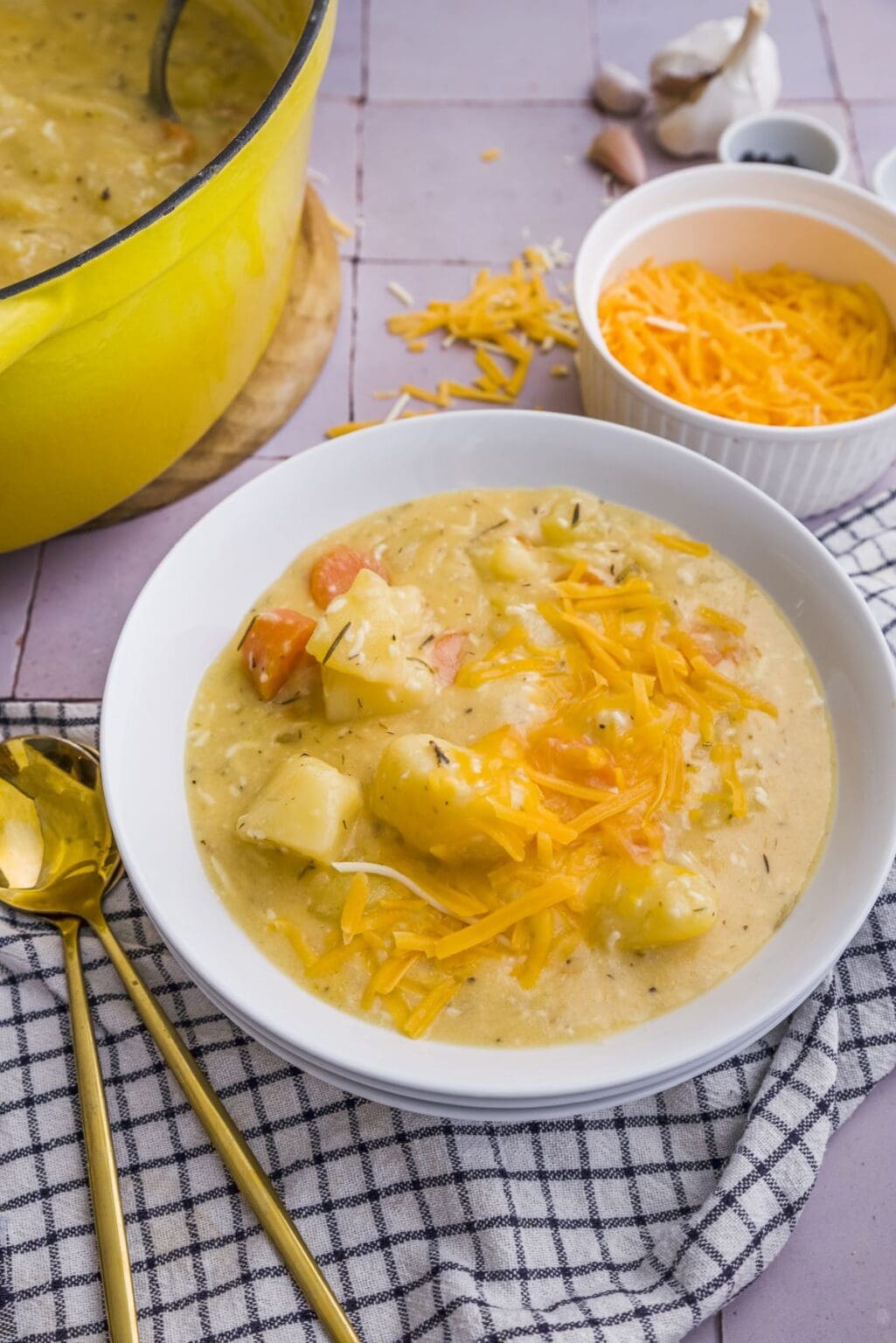 Dutch Oven Cheesy Potato Stew