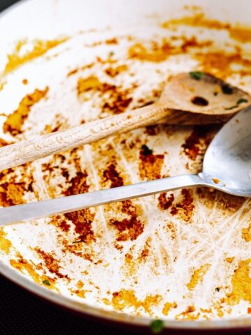 Burnt Food Stuck to Your Pan? Crumple Up This Kitchen Staple Before You Scrub