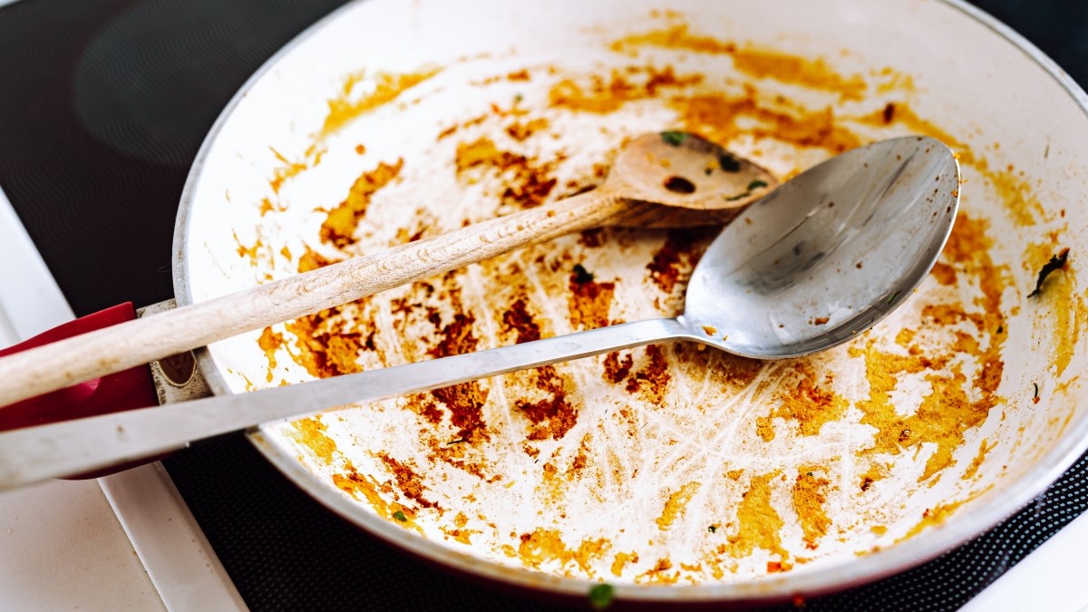 Burnt Food Stuck to Your Pan? Crumple Up This Kitchen Staple Before You Scrub